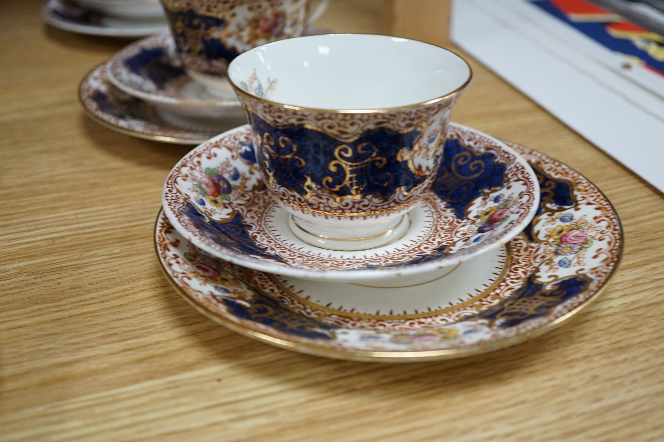 A Crown Staffordshire tea service decorated in white and gilt (46 pieces)